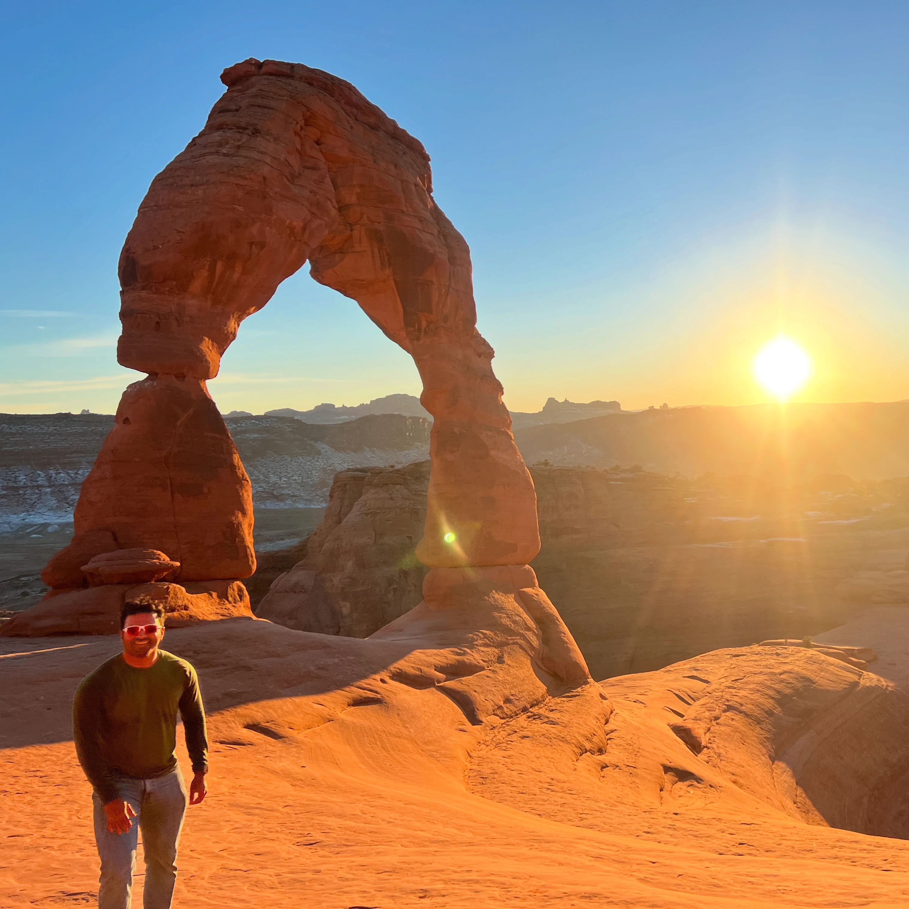 Founder at Delicate Arch during sunset